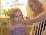 I used to work with Larissa and since she is a hairdresser, I asked her to come do Ruby's first cut at our house to keep Ruby more comfortable.  She did a great job!