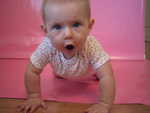Crawling after the camera.