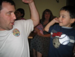 Uncle Chad and Jake showing their muscles.