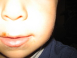 Jake interrupted eating his chocolate cake to take more pictures of himself.